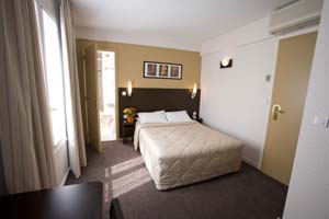 Superior double for single use with garden view, french bed, and private facilities (shower)
